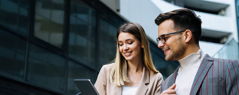 Two professional colleagues checking the data.