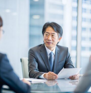 Management team working on a buyout transaction with advisers – Moore Australia