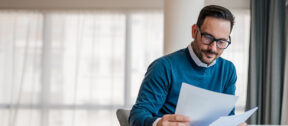 employer reviewing paperwork