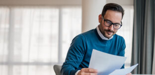 employer reviewing paperwork