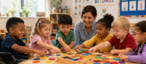 An educator guides a small group of young children through a hands-on wooden shape activity at a table in a bright, welcoming early learning classroom.