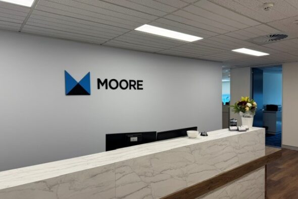 the Welcome Desk at Moore Australia in Canberra
